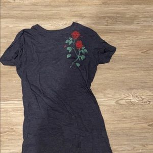 It’s a tight fitted T-shirt with roses